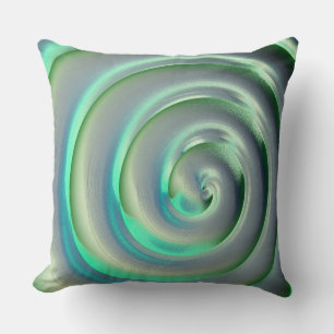 Riesensilber und Aquamarine-Spirale über grün Kissen