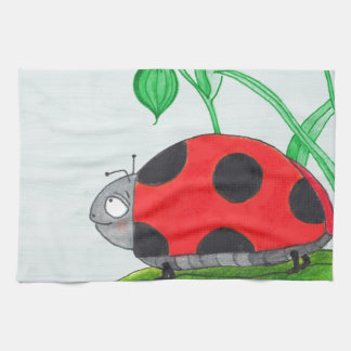 Riesiger roter Marienkäfer auf einem Blatt Geschirrtuch