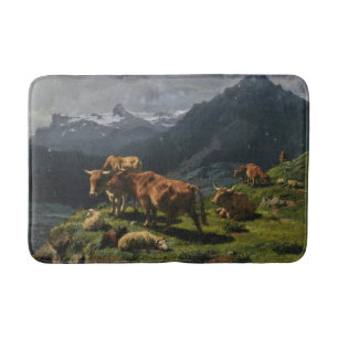 Rinder und Schafe in einer alpinen Landschaft Badematte