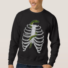 Rippenknochen mit Schlange und Halloween im Spinne