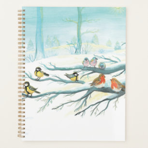 Robins rouges et Tit Birds en forêt d'hiver