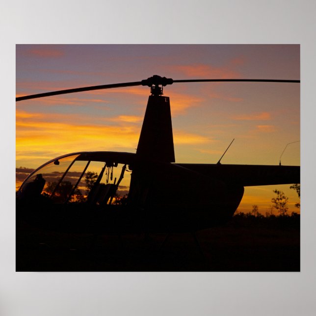 Robinson R44 Hubschrauber bei Sonnenuntergang Poster (Vorne)