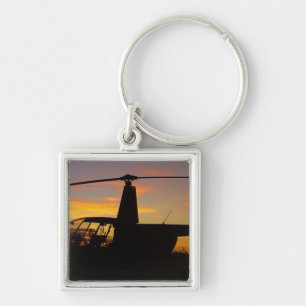 Robinson R44 Hubschrauber bei Sonnenuntergang Schlüsselanhänger
