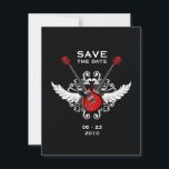 Rock and Roll Gitarren Save the Date<br><div class="desc">Mit dieser unkonventionellen Save the Date-Karte im Rock-Roll-Stil mit gekreuzten roten Rock-Gitarren,  Flügeln und Vintagen Ornamenten auf schwarz verkünden Sie Ihre Hochzeit. Personalisieren Sie es mit Ihren eigenen Informationen oder passen Sie es weiter an,  wenn Sie das Layout,  die Farben,  den Text oder die Einladungsgröße ändern möchten.</div>
