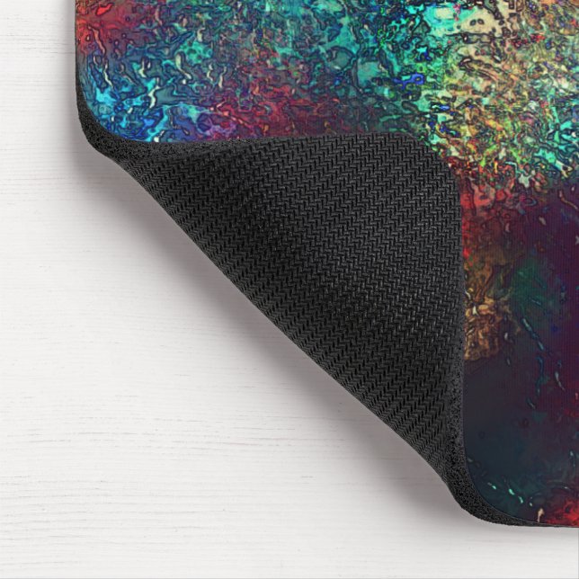 Rocky- oder Aluminiumfolie unter blauem und rotem  Mousepad (Ecke)