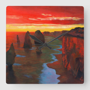 Rocky Seashore bei Sonnenuntergang Quadratische Wanduhr