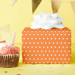 Rolle mit weißen Tupfen auf Halloween-Orange Geschenkpapier