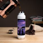 Romantic Moonlight Silhouette Asian Love Story art Trinkflasche<br><div class="desc">Step into a timeless tale of romance under the moonlight with this elegant Asian silhouette design. Featuring traditional lovers exchanging a flower beneath a glowing purple sky, this artwork captures the serenity and beauty of Eastern love stories. Perfect for art prints, greeting cards, notebooks, and more—ideal for fans of romantic,...</div>