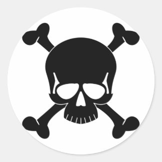 Rond Sticker pour le crâne et les os croisés