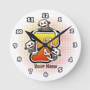 Ronde Horloge singe en chaussette F monogramme