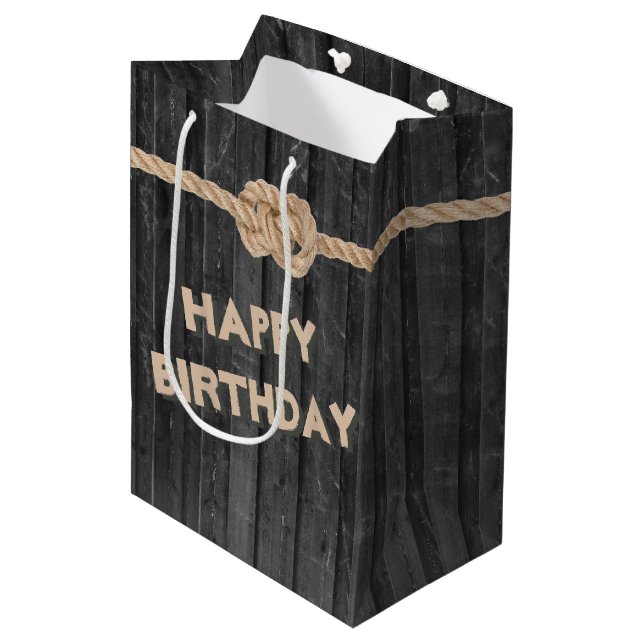 Rope Knot on black wood Medium Gift Bag Mittlere Geschenktüte (Vorderseite Schrägansicht)
