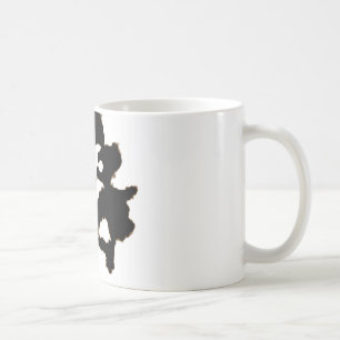 Rorschach Test einer Tinten-Fleck-Karte Kaffeetasse