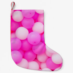 Rosa Balloons festes Hintergrunddesign. Kleiner Weihnachtsstrumpf