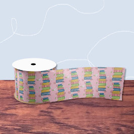 Rosa Band mit Kacheln aus Büchern und kleinen Blum Satinband