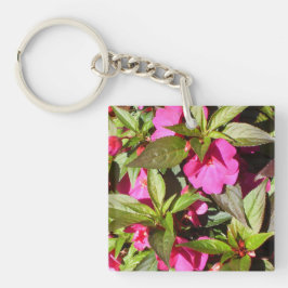 Rosa Begonias und grüne Shiny Blätter Schlüsselanhänger
