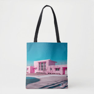 Rosa Beton Gebäude unter blauem Himmel Tasche