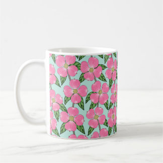 Rosa, blühende Dogwood-Linie, die auf Aqua blühend Kaffeetasse