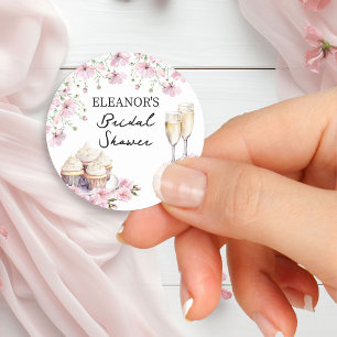 Rosa Blumen Champagnergläser und Cupcakes Runder Aufkleber