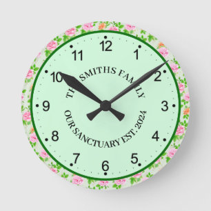 Rosa Blumenmuster Runde Wanduhr