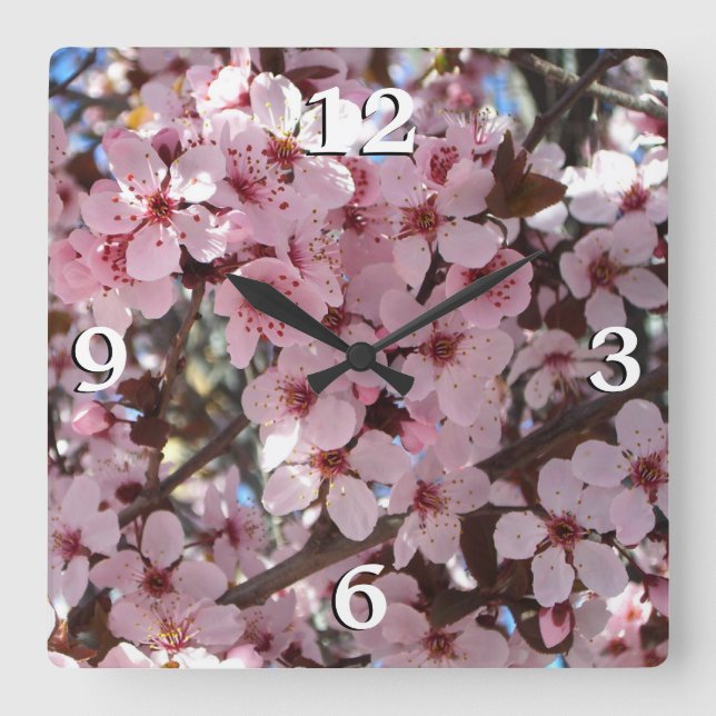 Rosa Blüten auf Zierblumen Quadratische Wanduhr (Vorderseite)