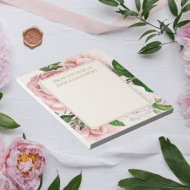 Rosa Blütencreme aus dem Schreibtisch Notizblock