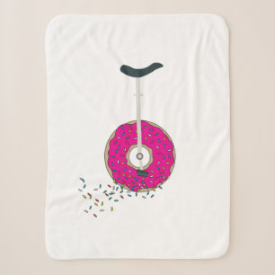 Rosa Donut Wheel Einrad mit farbenfrohen Sprinklen Sherpadecke