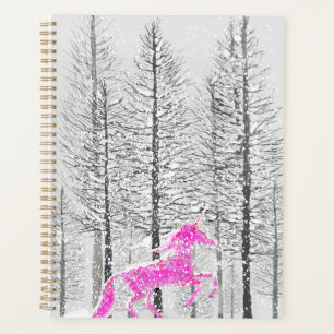 Rosa Einhorn in schneebewaldeten Aquarellen Planer