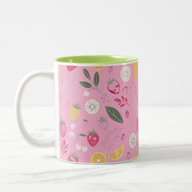 Rosa Erdbeere und zweiteilige florale Tasse (Links)