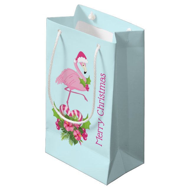 Rosa Flamingo in Weihnachtsmannmütze mit Candy Can Kleine Geschenktüte (Vorderseite Schrägansicht)