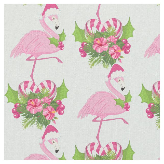 Rosa Flamingo in Weihnachtsmannmütze mit Candy Can Stoff (Nahaufnahme)