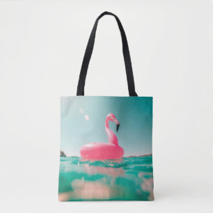 Rosa Flamingo schwimmen auf dem Körper des Wasser Tasche