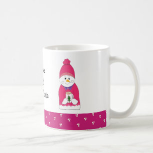 Rosa Frostschneemann mit heißer Schokolade Kaffeetasse