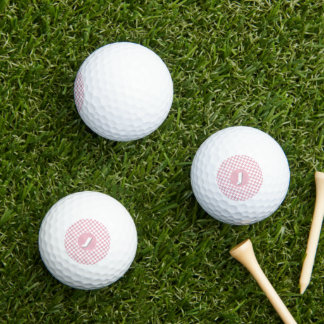 rosa Geländertes Muster Golfball