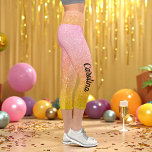 Rosa Gelb Glitzer Ombre Sparkle Capri Leggings<br><div class="desc">Rosa Gelber Glitzer Ombre Sparkle Capri Leggings mit Imitaten Rosa Gelber Glitzer Hintergrund und Name in schwarz. Verwenden Sie die Option Vorlage personalisieren, um den Text zu ändern | Verwenden Sie weitere Optionen, um den Textstil, die Textgröße und -farbe bei Bedarf zu ändern. Wenn Sie keinen Text benötigen, löschen Sie...</div>