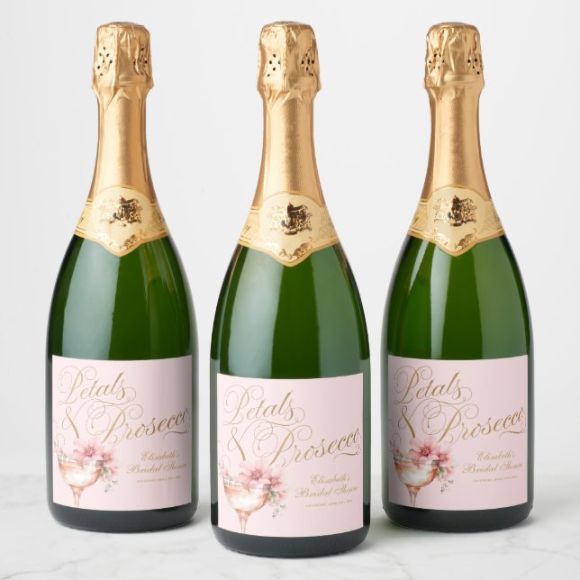 Rosa Goldfloralen-Petalen und Prosecco-Brautparty (Flaschen)
