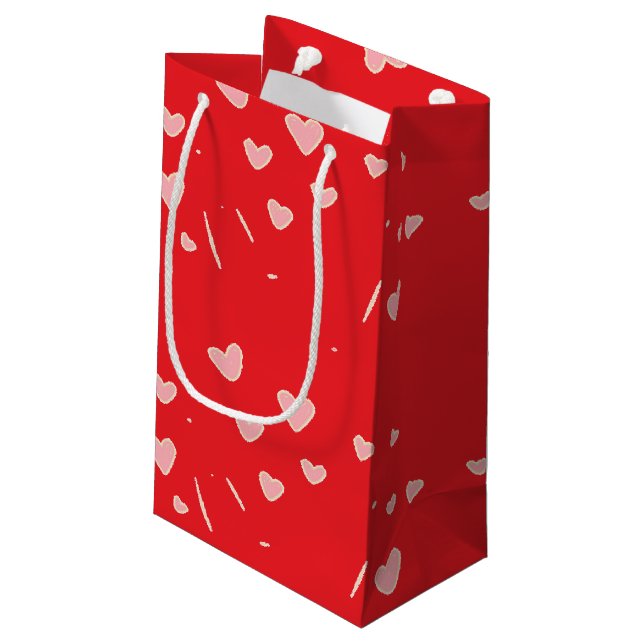 Rosa Herzen auf Rot Kleine Geschenktüte (Rückseite Schrägansicht)