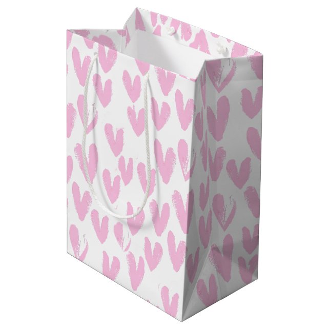 Rosa Herzen auf Weiß Mittlere Geschenktüte (Rückseite Schrägansicht)