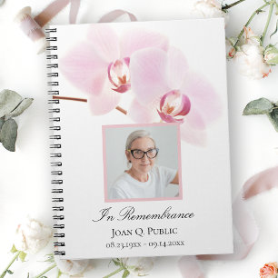 Rosa Orchideen auf dem White Funeral Memorial Gäst Notizblock