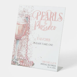 Rosa Perlen und Prosecco-Favoriten Sockelschild