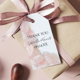 Rosa Quarz auf den Tags der weißen Gastgeschenk Ho Geschenkanhänger