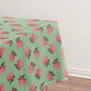 Rosa Rosenblüten auf Hellgrün Tischdecke