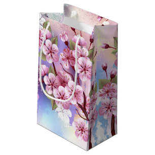 Rosa Sakura auf dem Hintergrund der Malerei Kleine Geschenktüte