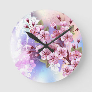 Rosa Sakura auf dem Hintergrund der Malerei Runde Wanduhr