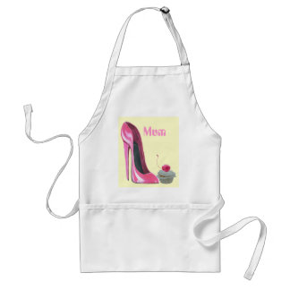 Rosa Stilett-Schuh und kleiner Kuchen Schürze
