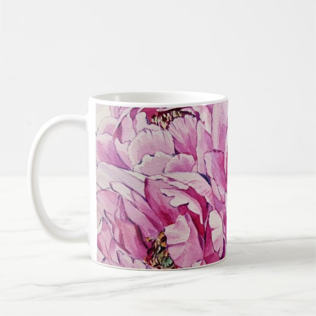 Rosa Tasse mit Blumenmuster (Links)