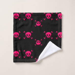 Rosa Totenkopf mit gekreuzter Knochen auf Waschlappen