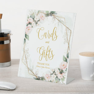Rosa und goldene Blumengeschenke und -karten Sockelschild