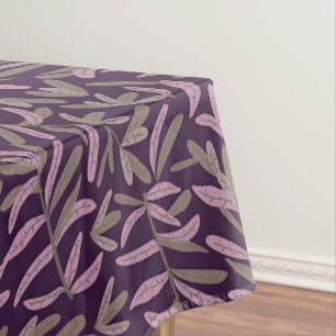 Rosa und grünes Blattmuster auf dunklem violetten Tischdecke
