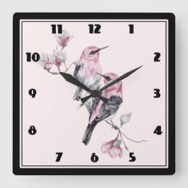 Rosa und schwarze Vögel auf einem Baumzweig Quadratische Wanduhr