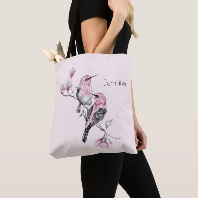 Rosa und schwarze Vögel auf einem Baumzweig Tasche (Von Nahem)